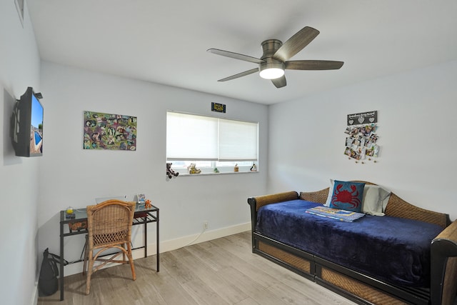 bedroom featuring ceiling fan and light hardwood / wood-style floors