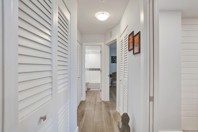 hallway featuring light hardwood / wood-style floors