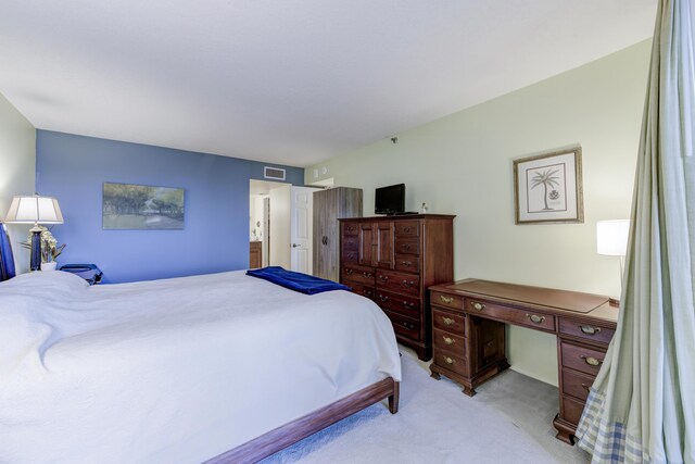 carpeted bedroom with expansive windows