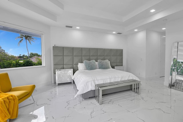 bedroom featuring a tray ceiling