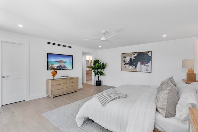 bedroom featuring light hardwood / wood-style flooring and ceiling fan