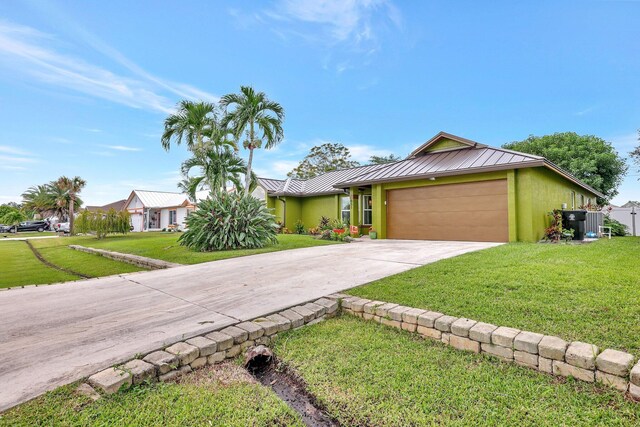 ranch-style home with a front yard and a garage