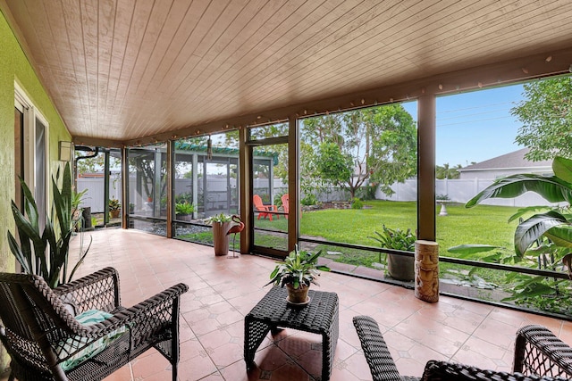 sunroom / solarium with wood ceiling