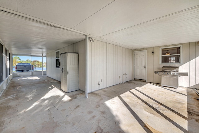 view of patio with a grill and a carport