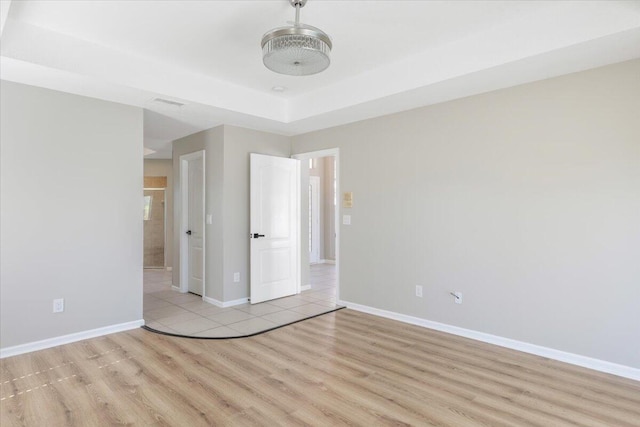 unfurnished room with light hardwood / wood-style floors