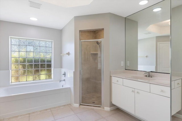 bathroom with vanity, separate shower and tub, and tile patterned floors