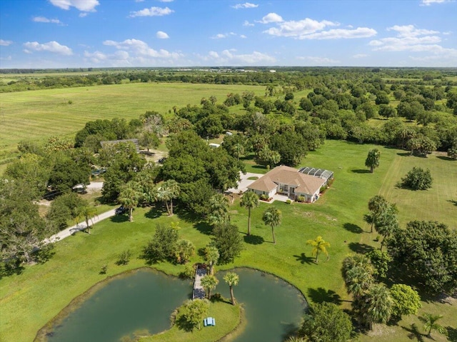 birds eye view of property with a water view and a rural view