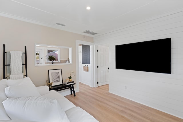 living room with light hardwood / wood-style flooring