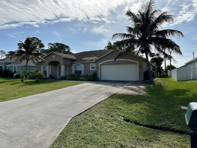 single story home with a front yard and a garage