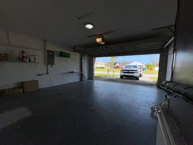 garage featuring a garage door opener