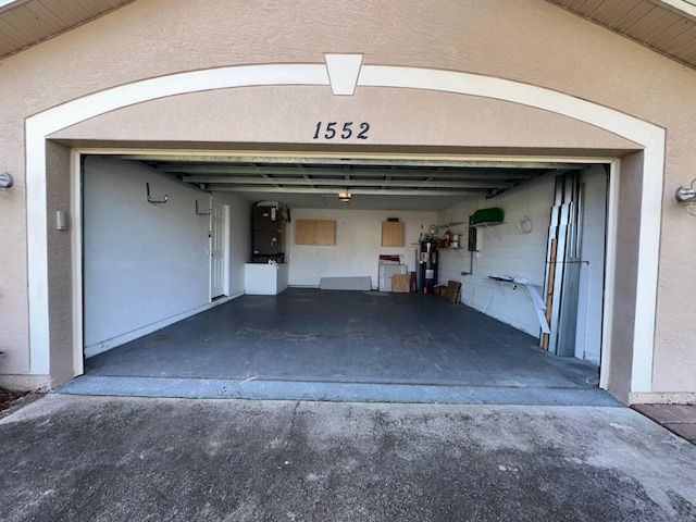 garage with electric water heater