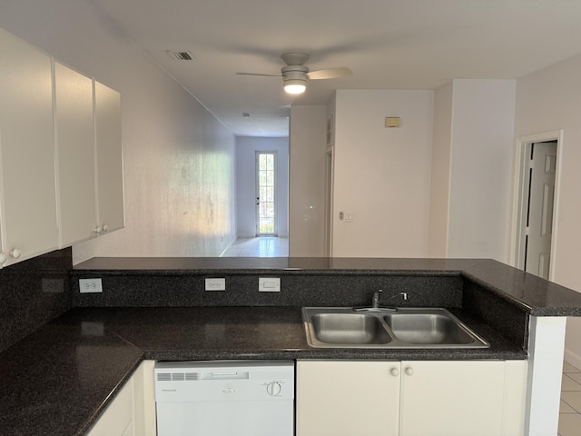 kitchen featuring ceiling fan, white cabinets, white dishwasher, sink, and kitchen peninsula