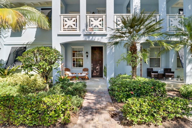 property entrance with a balcony