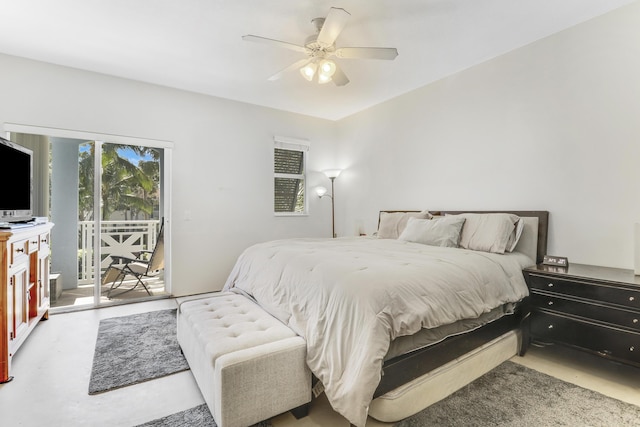 bedroom with ceiling fan, access to exterior, and finished concrete flooring