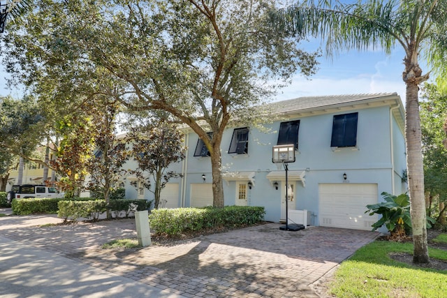 view of front of property featuring a garage