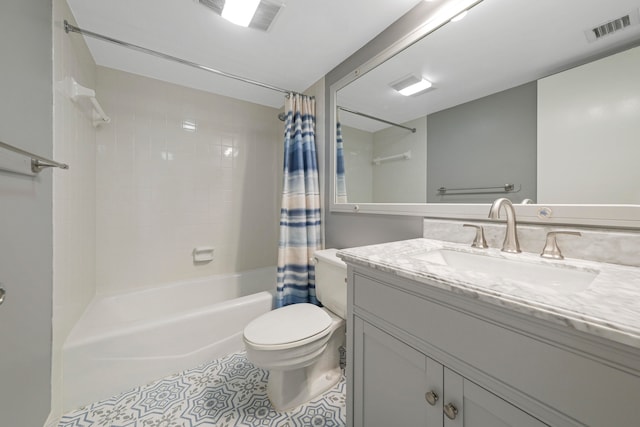 full bathroom with vanity, toilet, and shower / tub combo