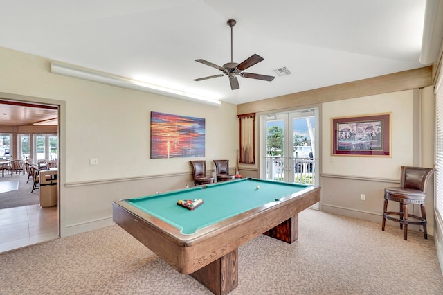 game room featuring light colored carpet, a healthy amount of sunlight, and french doors