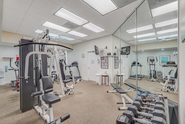 workout area with a drop ceiling