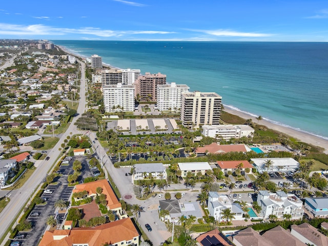 aerial view with a beach view and a water view