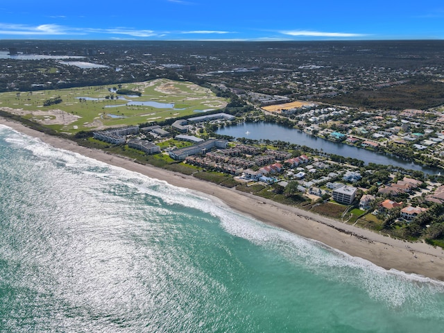 bird's eye view with a beach view and a water view