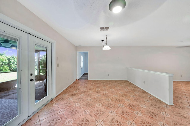 empty room featuring light tile patterned floors