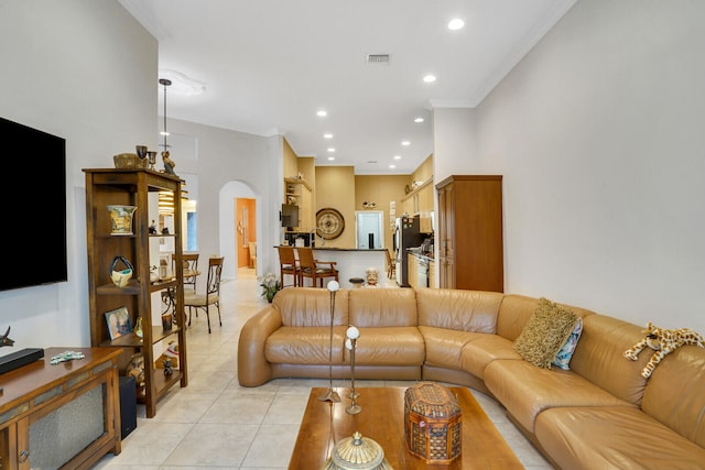 tiled living room with ornamental molding