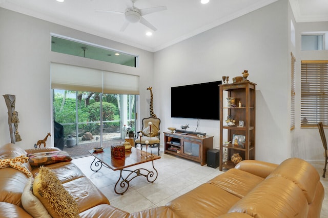 tiled living room with ceiling fan and ornamental molding