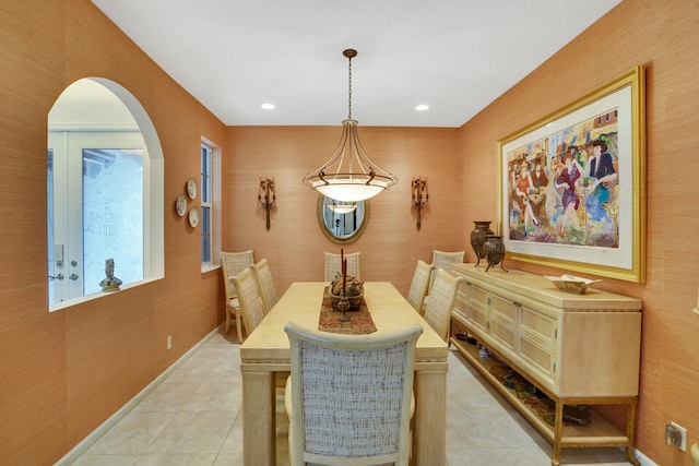 dining area featuring light tile patterned floors