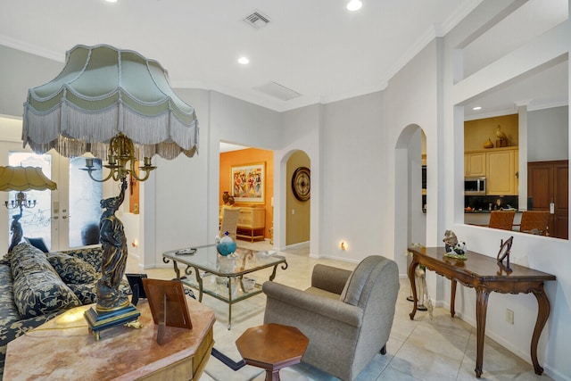 tiled living room with ornamental molding