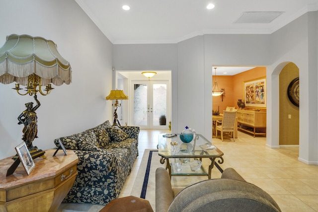 tiled living room featuring french doors and crown molding