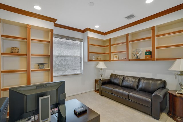 living room featuring crown molding