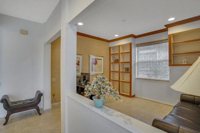 living room featuring crown molding