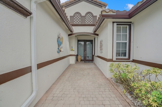 view of exterior entry with french doors