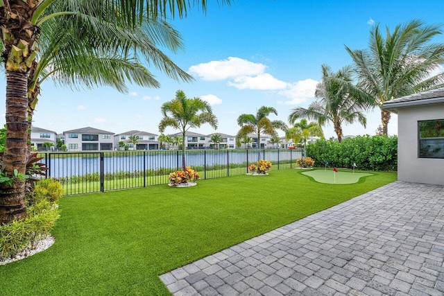 view of yard with a water view