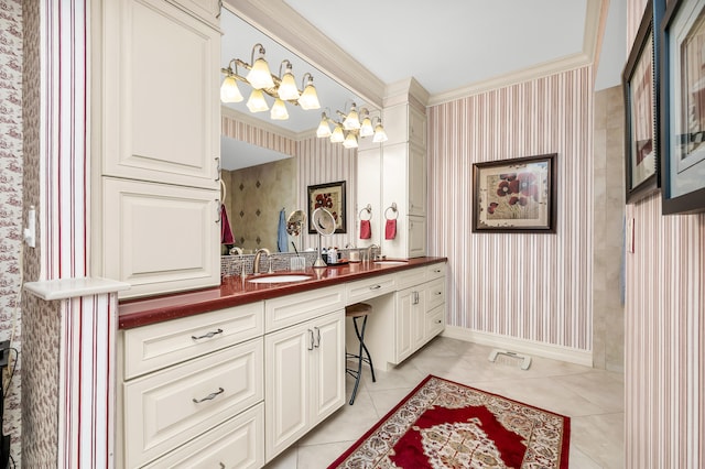 bathroom featuring ornamental molding, tile patterned flooring, and vanity