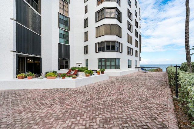 view of property with a water view