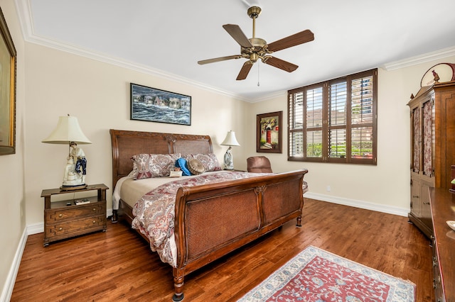 bedroom featuring ceiling fan, hardwood / wood-style flooring, and crown molding