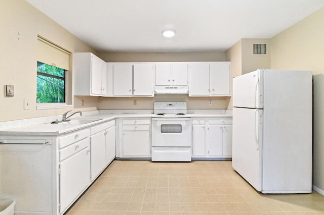 kitchen featuring white appliances, white cabinetry, and sink