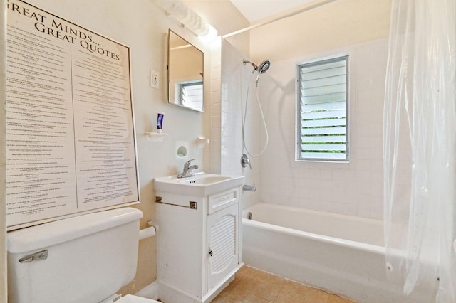 full bathroom featuring shower / bath combo with shower curtain, tile patterned flooring, vanity, and toilet