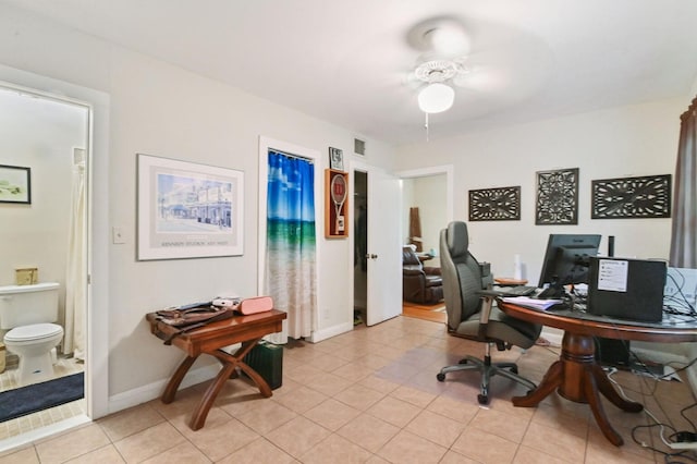 tiled office with ceiling fan