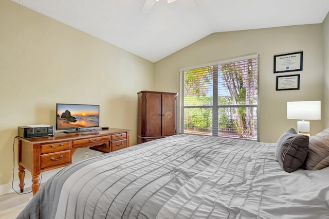 bedroom featuring lofted ceiling and ceiling fan