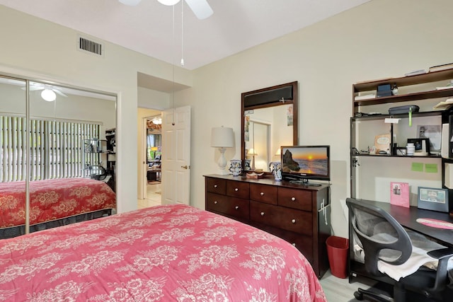 bedroom featuring ceiling fan and a closet