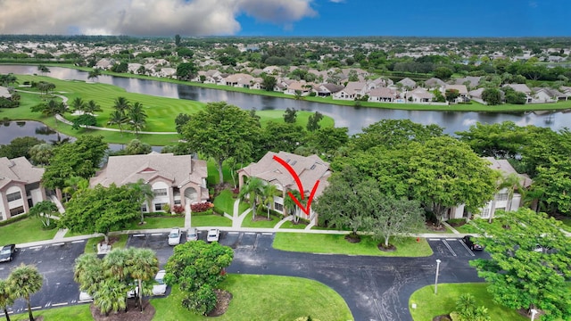 drone / aerial view featuring a water view