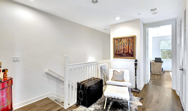 living area with wood-type flooring