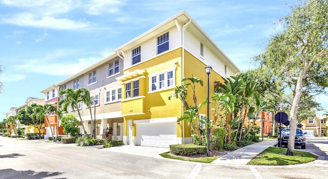 view of property with a garage