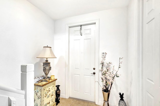 entrance foyer with light tile patterned floors