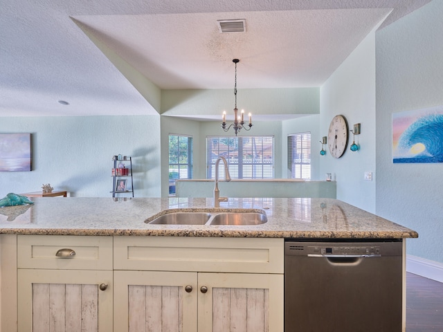 kitchen featuring light stone counters, dishwasher, sink, and dark wood-type flooring