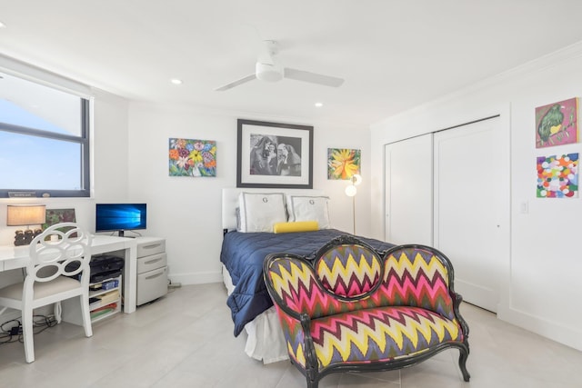 bedroom with a closet, ceiling fan, and ornamental molding