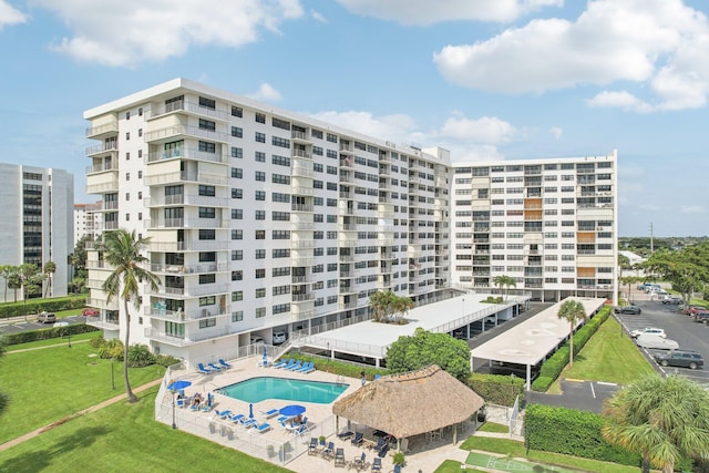 view of property featuring a community pool