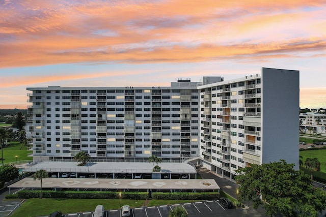 view of outdoor building at dusk